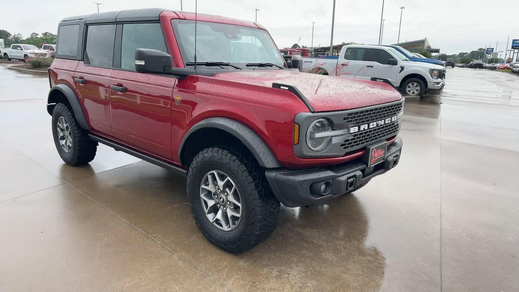 Used 2025 Ruby Red Metallic Ford Badlands image 2