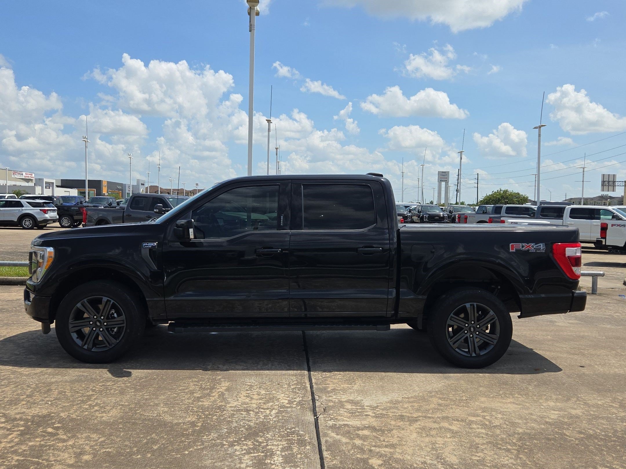 Used 2023 Agate Black Metallic Ford Lariat image 6