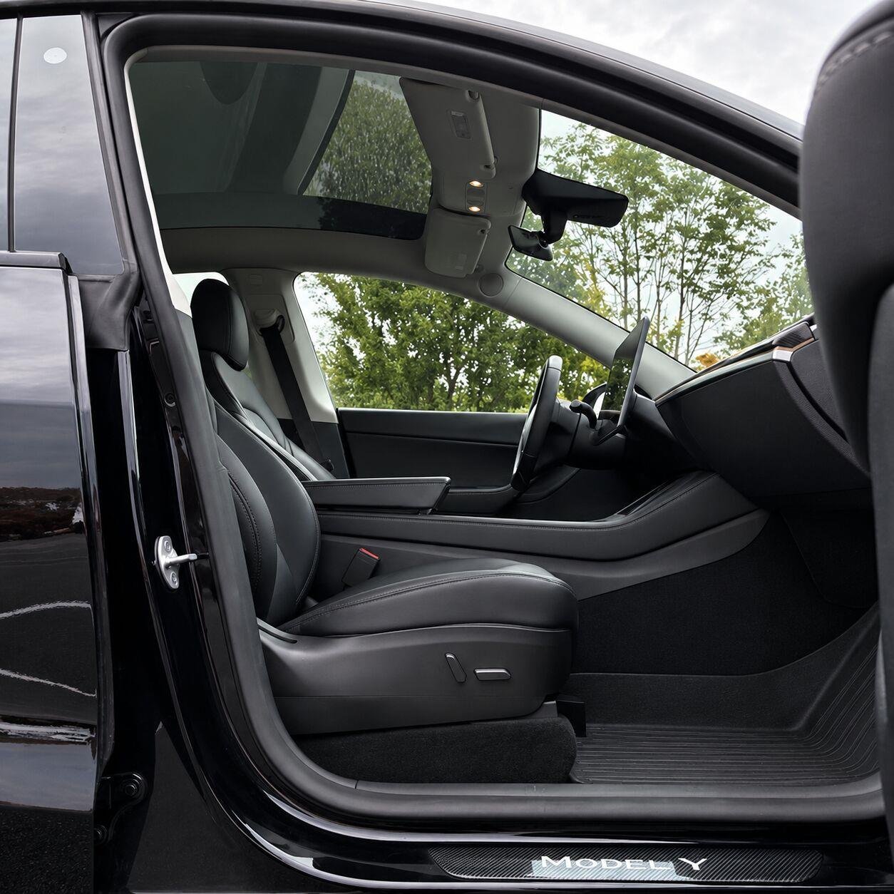 Used 2022 Solid Black Tesla Performance image 11