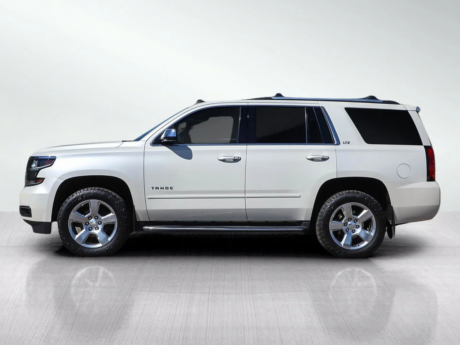 Used 2015 Chevrolet Tahoe LTZ with VIN 1GNSKCKC5FR100621 for sale in Bloomington, Minnesota