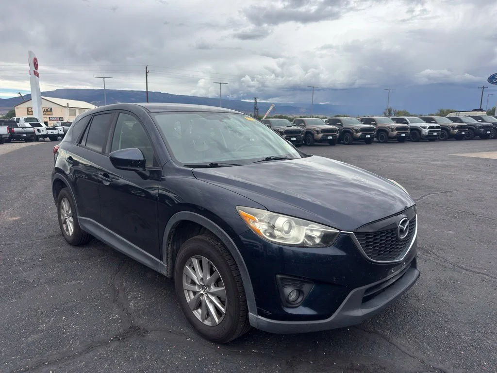 Used 2015 Crystal Blue Mazda Touring image 1
