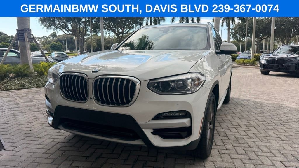 Used 2021 Alpine White BMW sDrive30i image 2