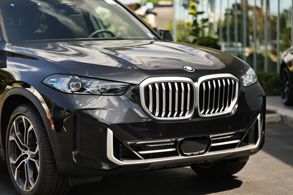 New 2026 Black Sapphire Metallic BMW xDrive50e image 2