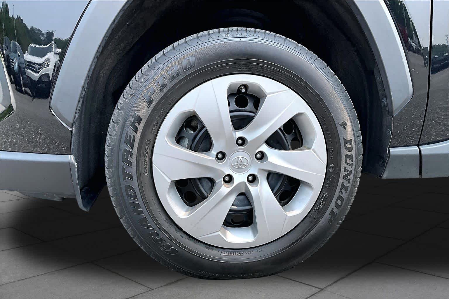 Used 2023 Midnight Black Metallic Toyota LE image 11