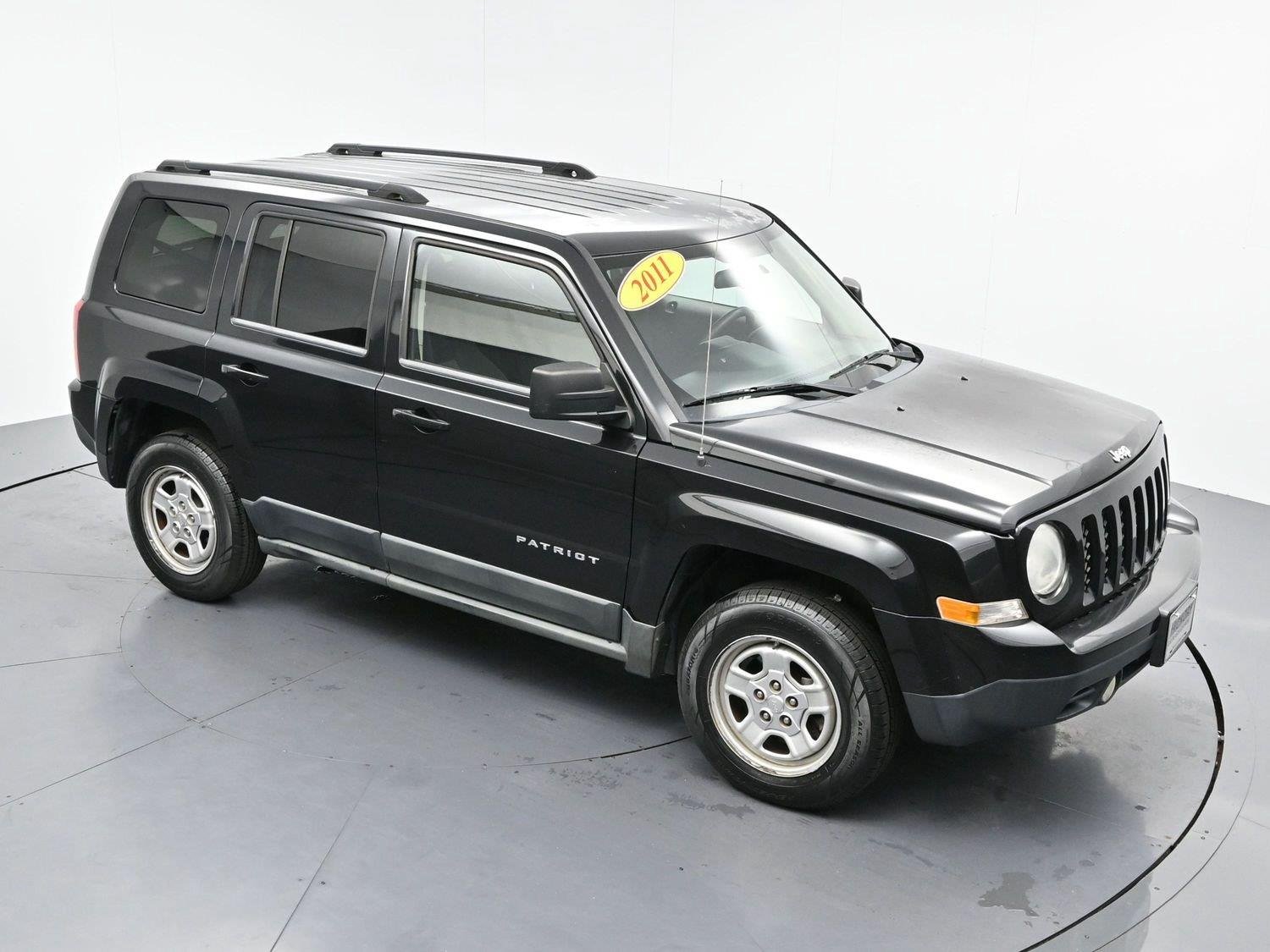 Used 2011 Brilliant Black Crystal Pearl Jeep Sport image 28