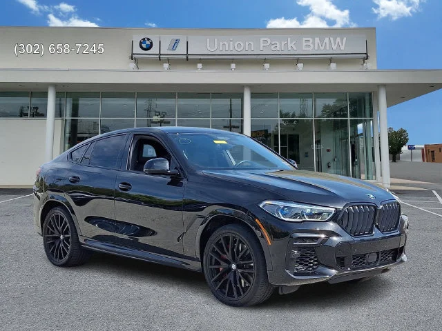 Used 2022 Black Sapphire Metallic BMW M50i image 3