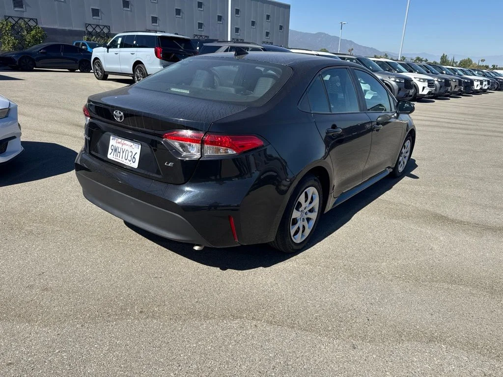 Used 2024 Midnight Black Metallic Toyota LE image 6