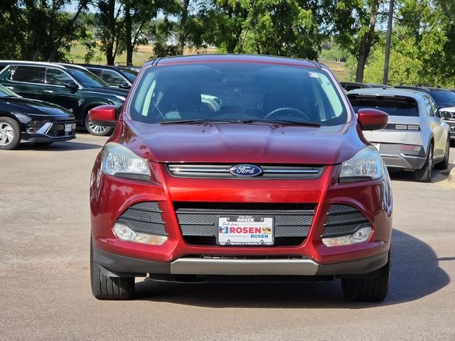Used 2016 Orange Ford SE image 2