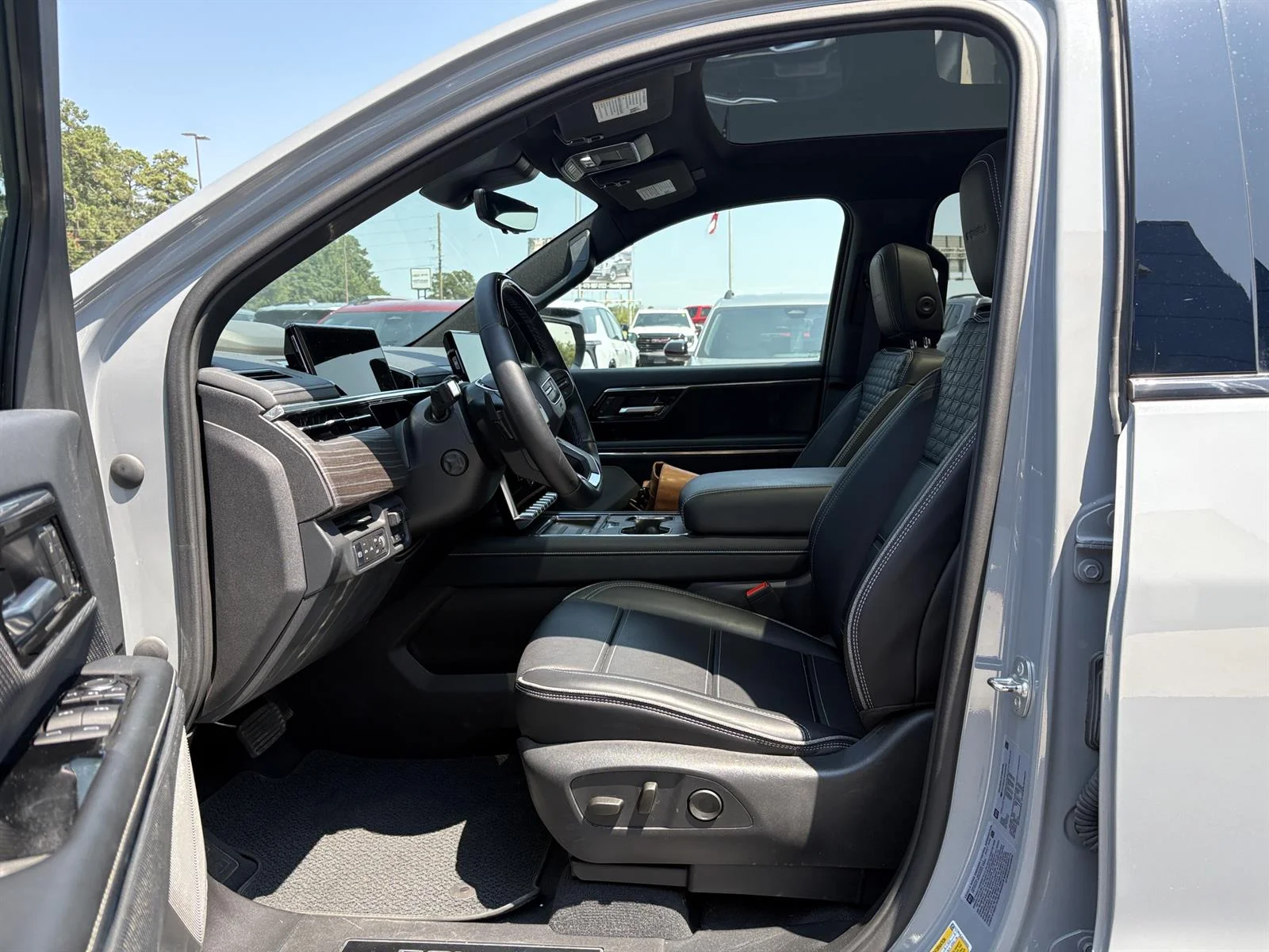 Used 2025 Thunderstorm Gray GMC Max Range Denali image 25