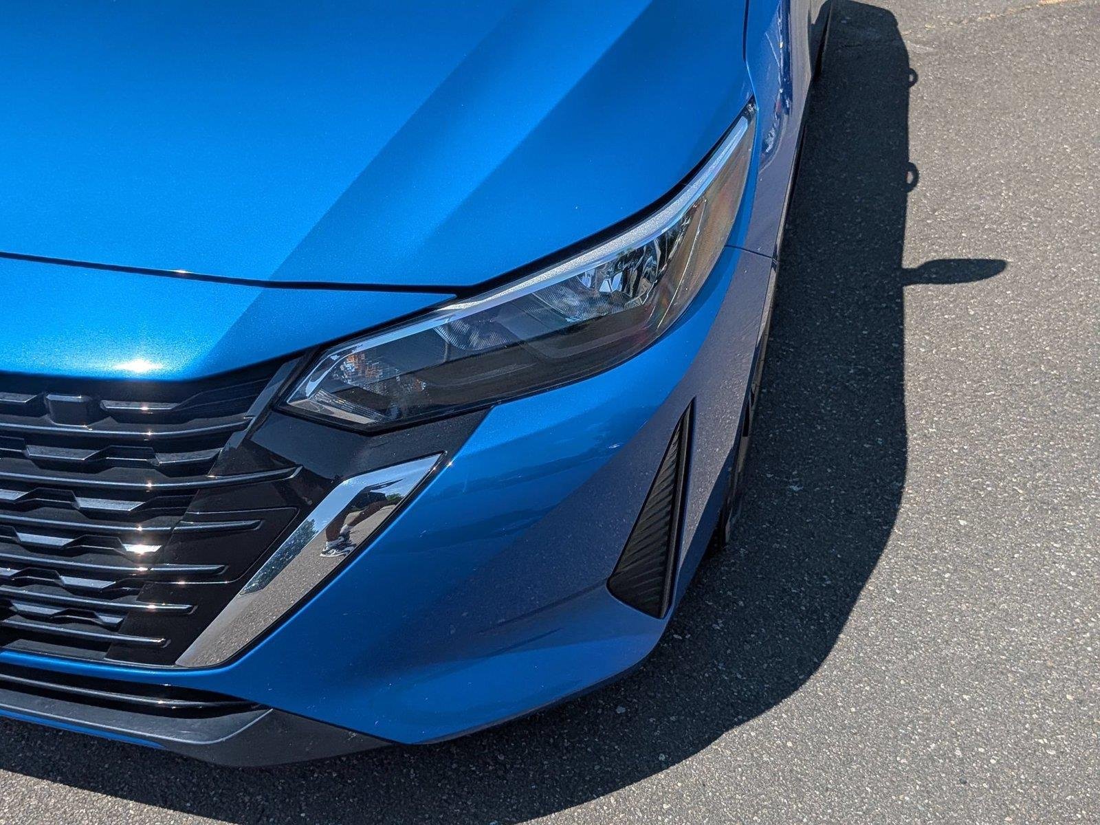 Used 2025 Electric Blue Metallic Nissan SV image 9