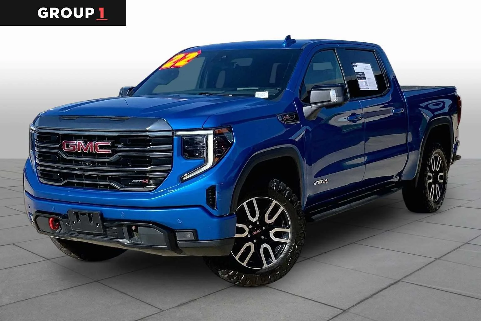 Used 2022 DYNAMIC BLUE METALLIC GMC AT4 image 1