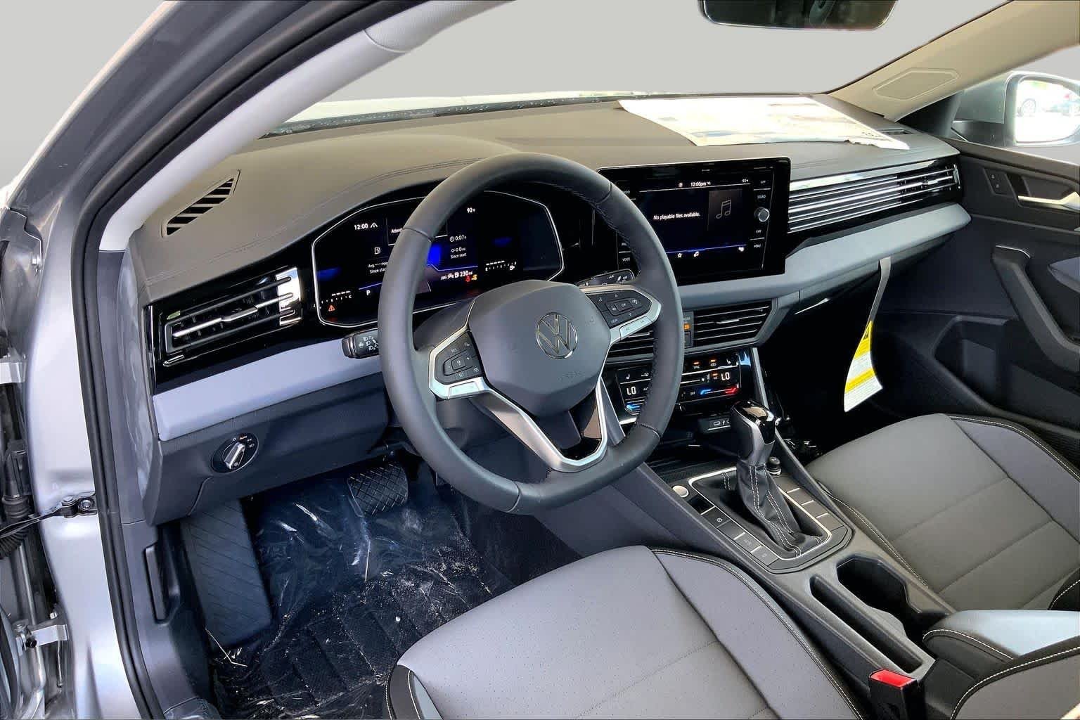 New 2026 Pyrite Silver Metallic Volkswagen SE image 8