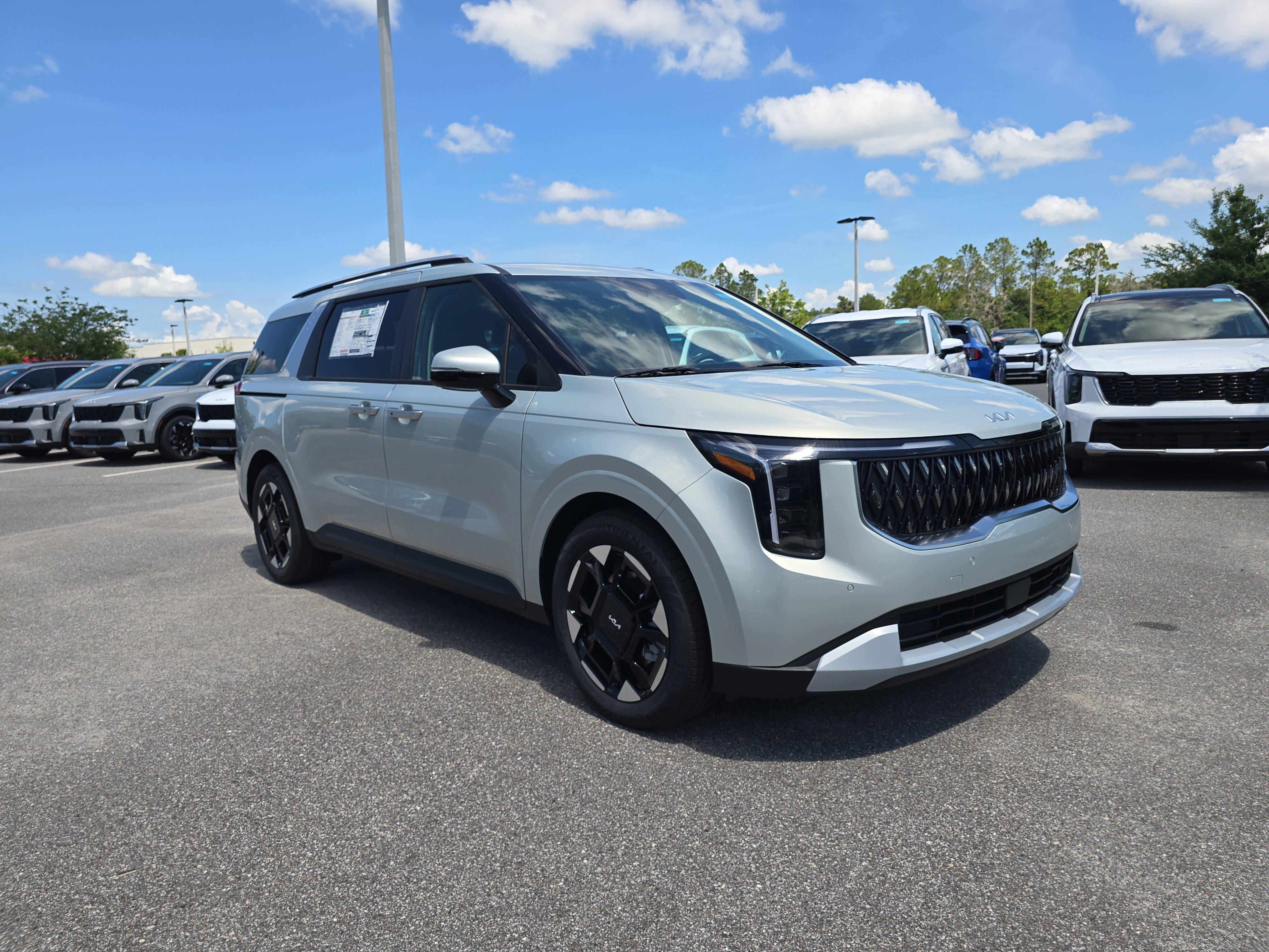 New 2026 Ivory Silver Kia EX image 2