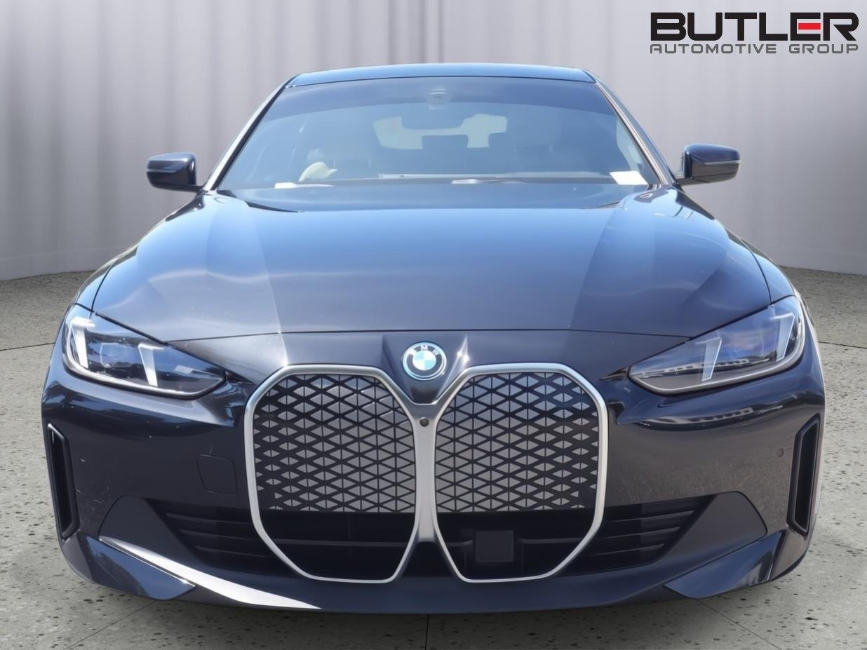 Used 2025 Black Sapphire Metallic BMW eDrive40 image 2