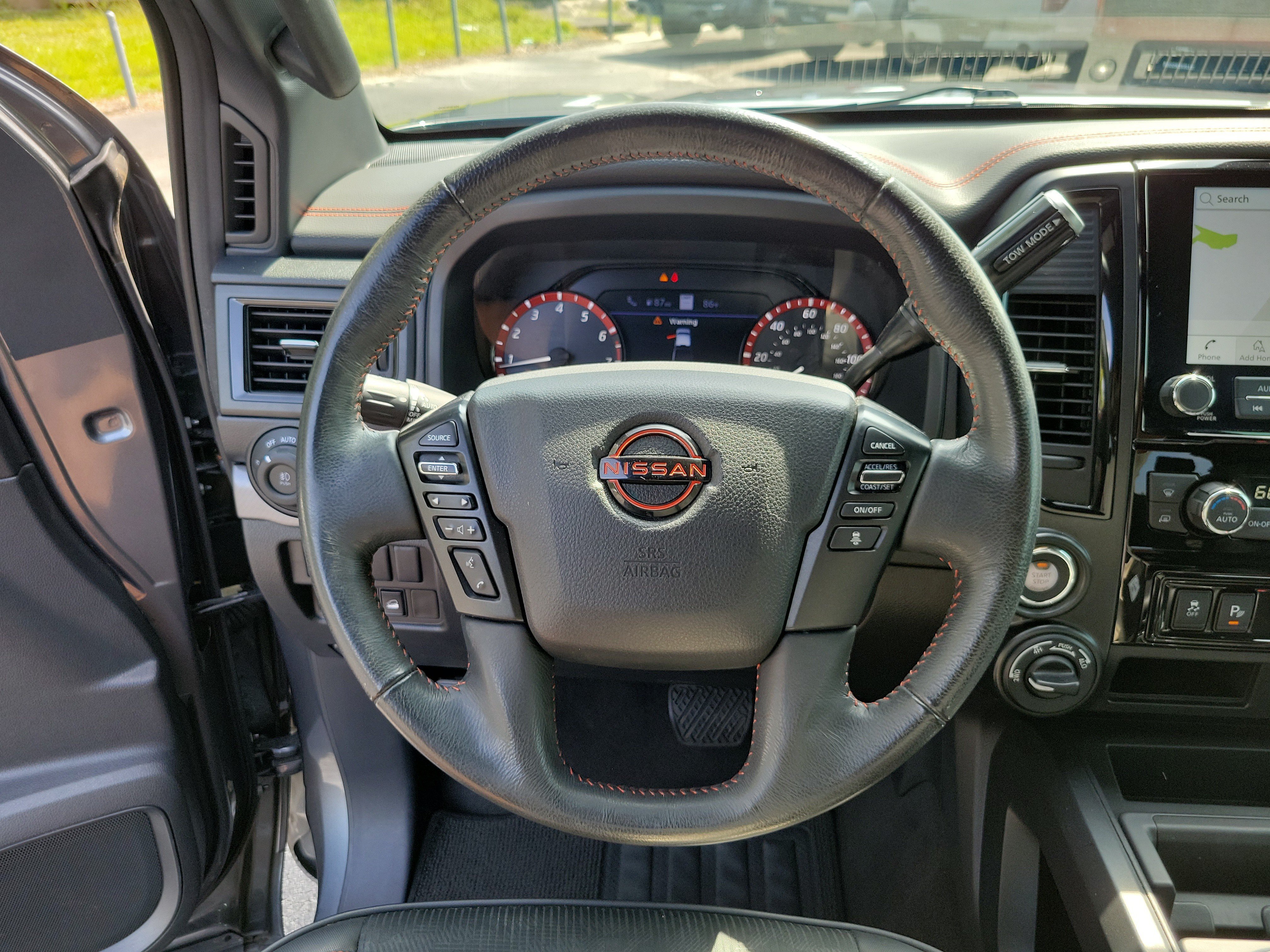 Used 2024 Gun Metallic Nissan PRO-4X image 24