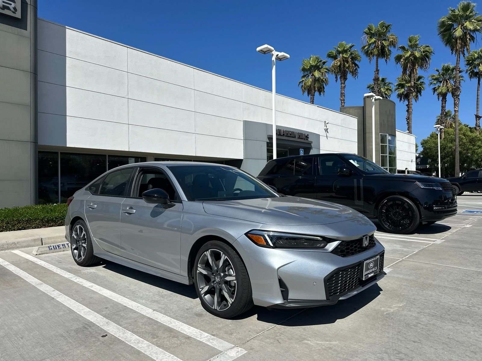Used 2025 Solar Silver Metallic Honda Sport image 2