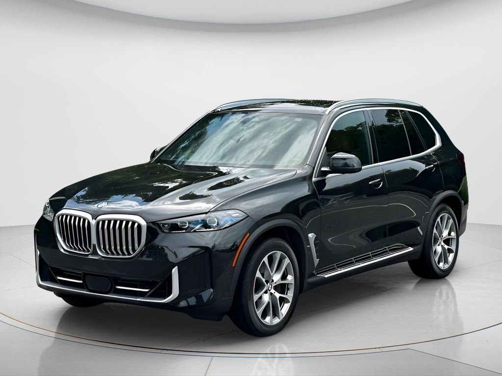 Used 2026 Black Sapphire Metallic BMW xDrive40i image 1