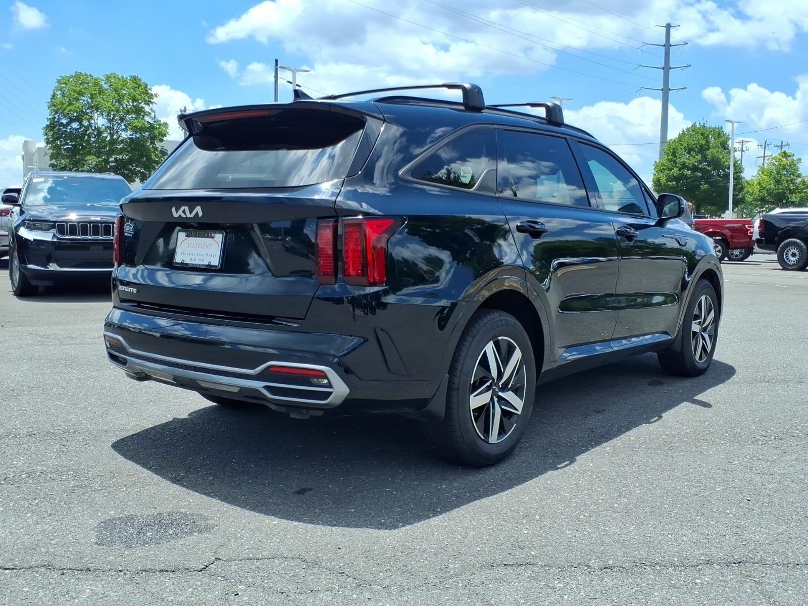Used 2023 Ebony Black Kia EX image 3