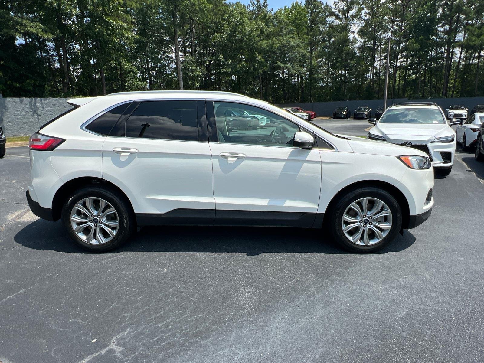 Used 2022 Star White Metallic Tri-Coat Ford Titanium image 4