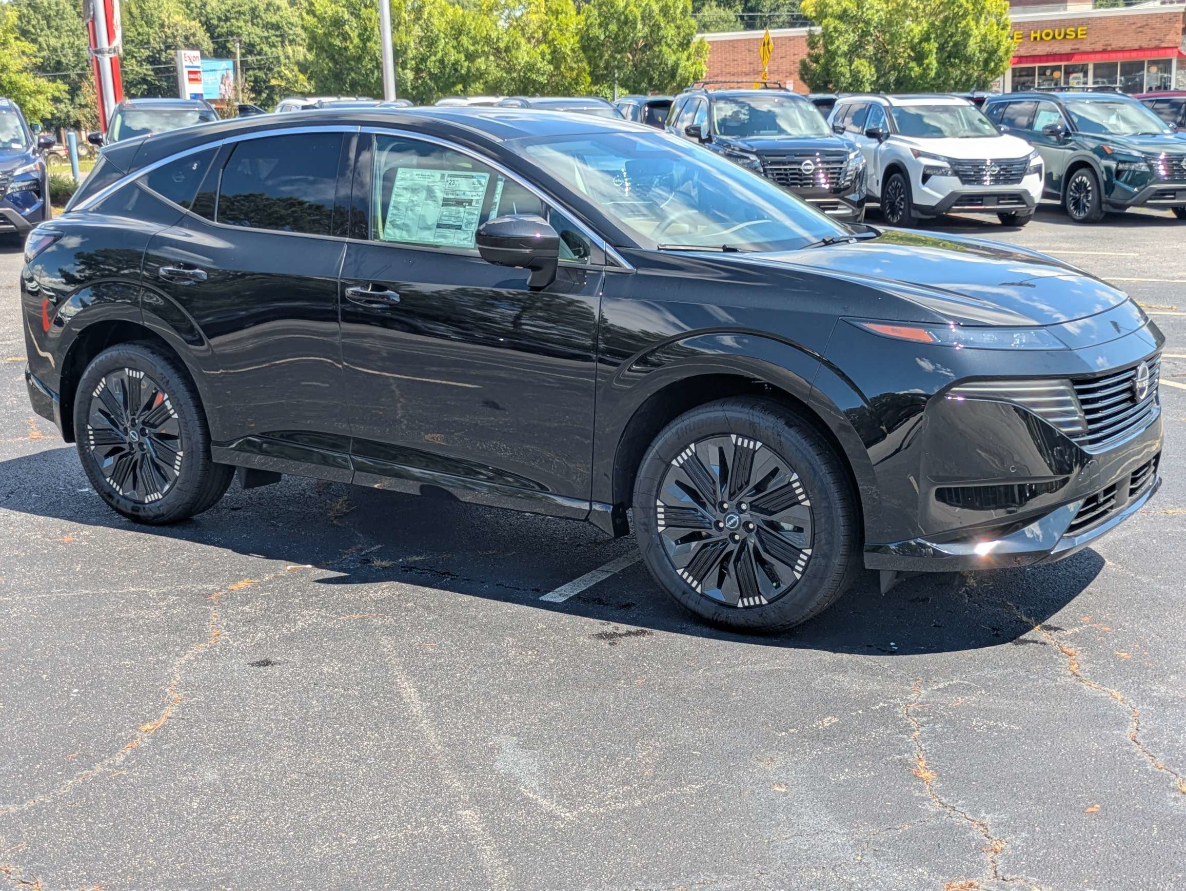 New 2026 Black Nissan Platinum image 1