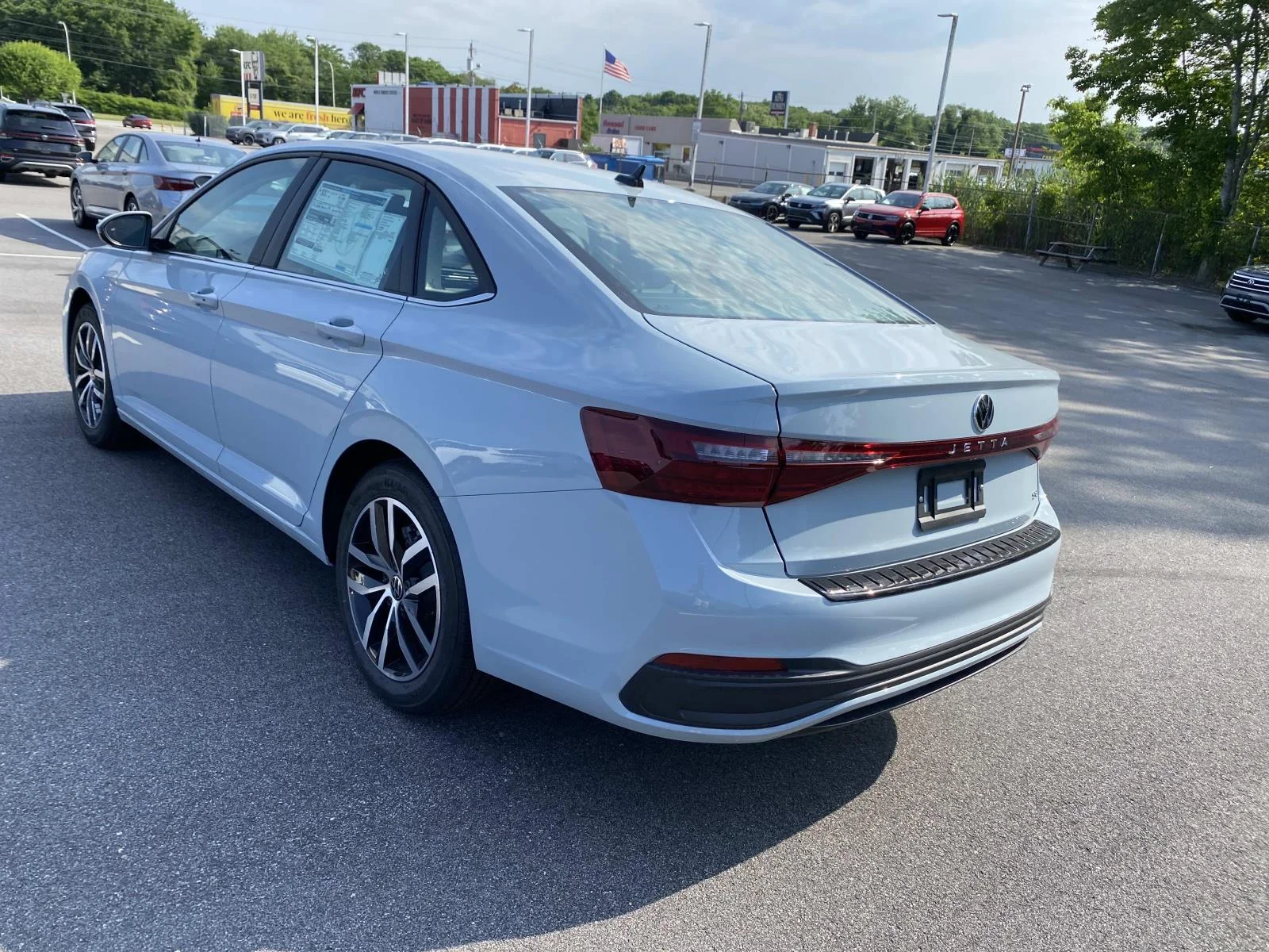 New 2026 Monument Gray Volkswagen SE Auto image 3