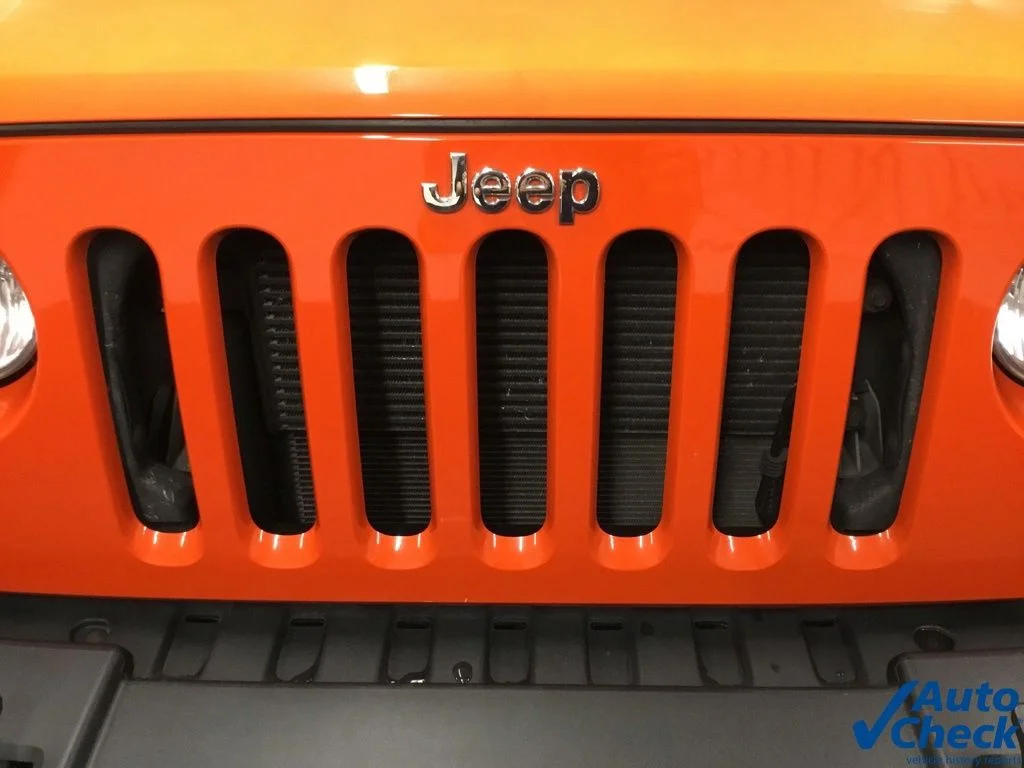 Used 2015 Orange Jeep Unlimited Sport image 23