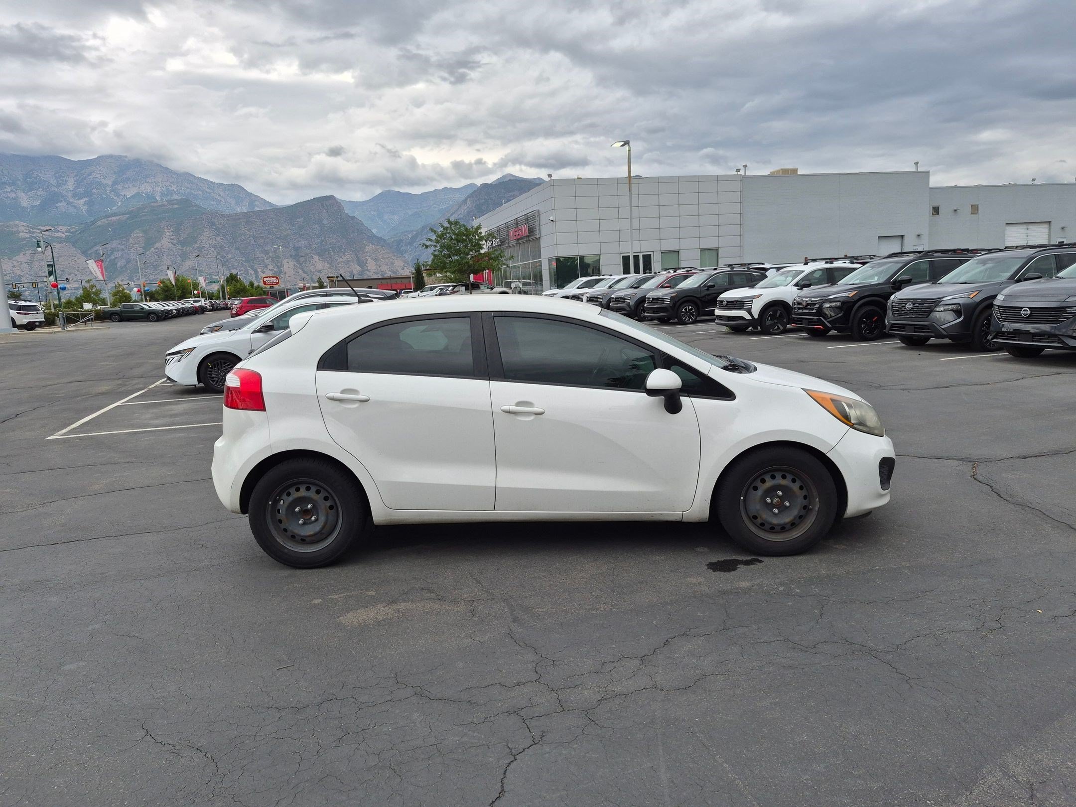 Used 2013 Kia Rio 5-Door LX with VIN KNADM5A31D6195876 for sale in Orem, UT