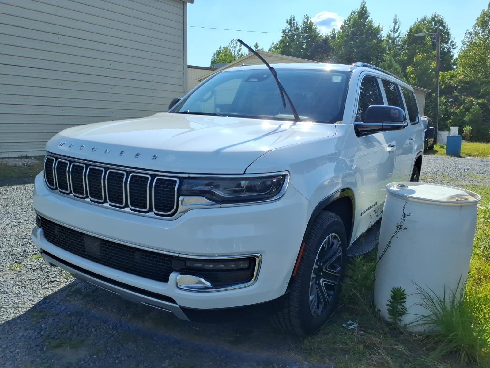 Used 2024 Bright White Clearcoat Jeep Series II image 1