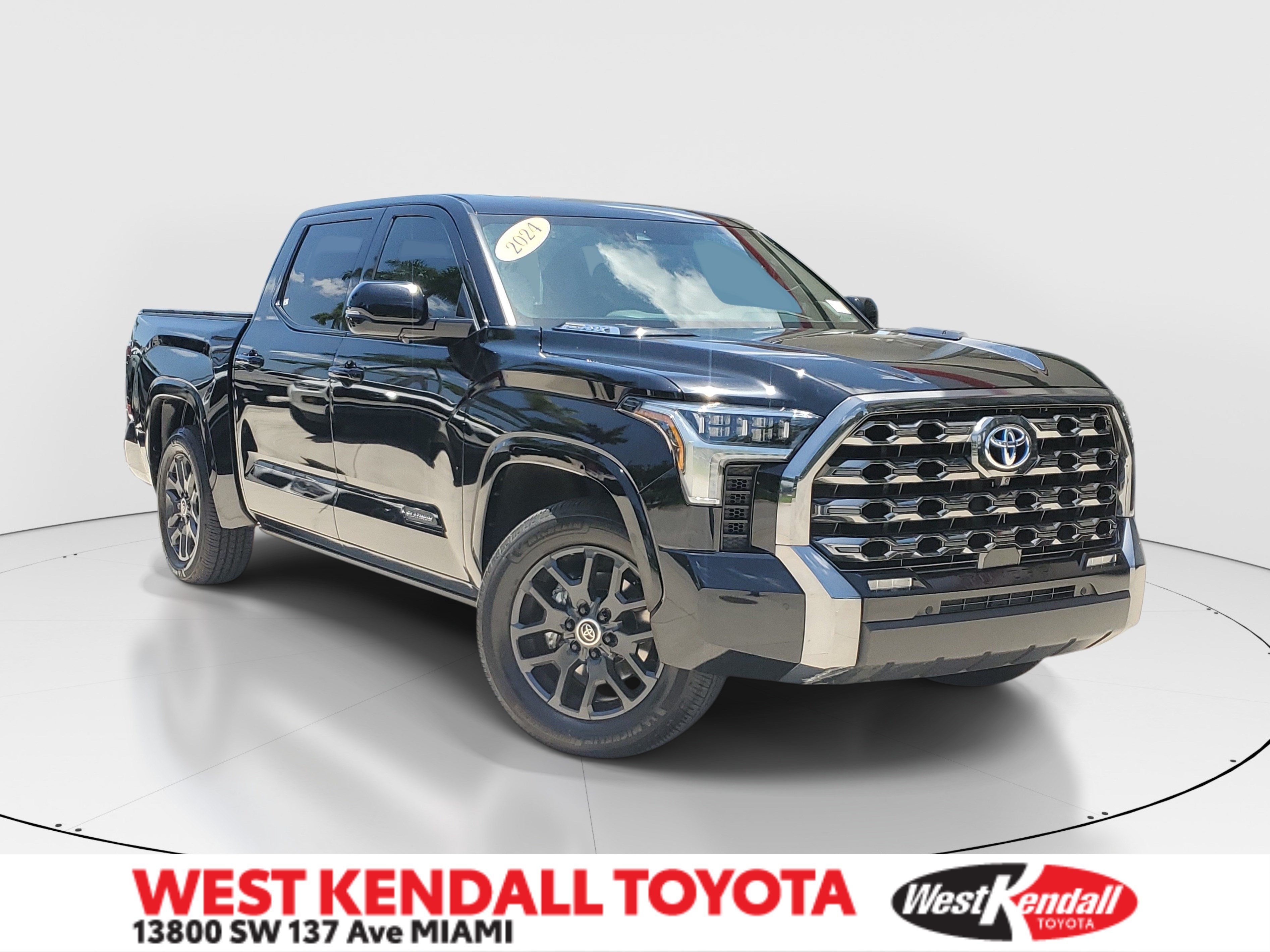 Used 2024 Midnight Black Metallic Toyota Platinum Hybrid image 1