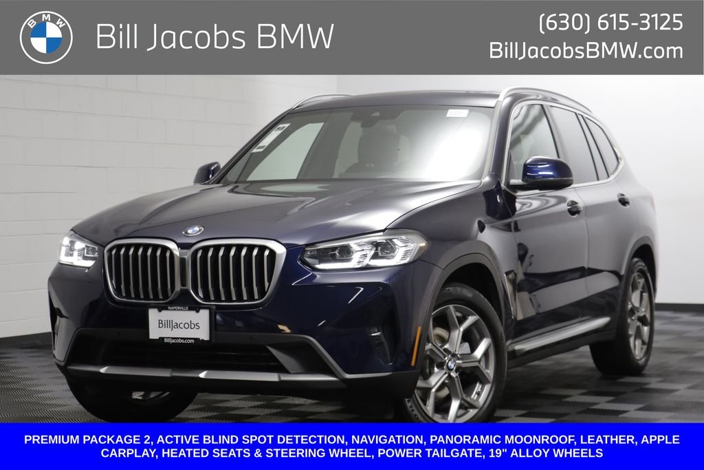 Used 2022 Tanzanite Blue II Metallic BMW xDrive30i image 1