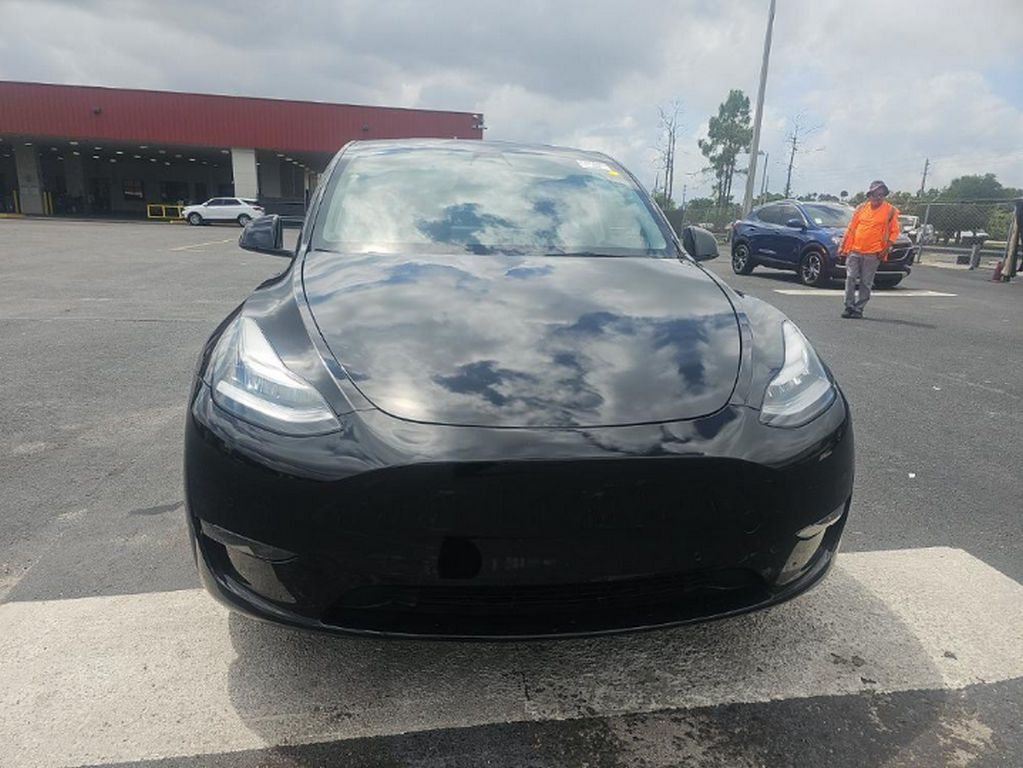 Used 2022 Tesla Model Y Long Range with VIN 7SAYGAEE2NF456635 for sale in Miami, FL