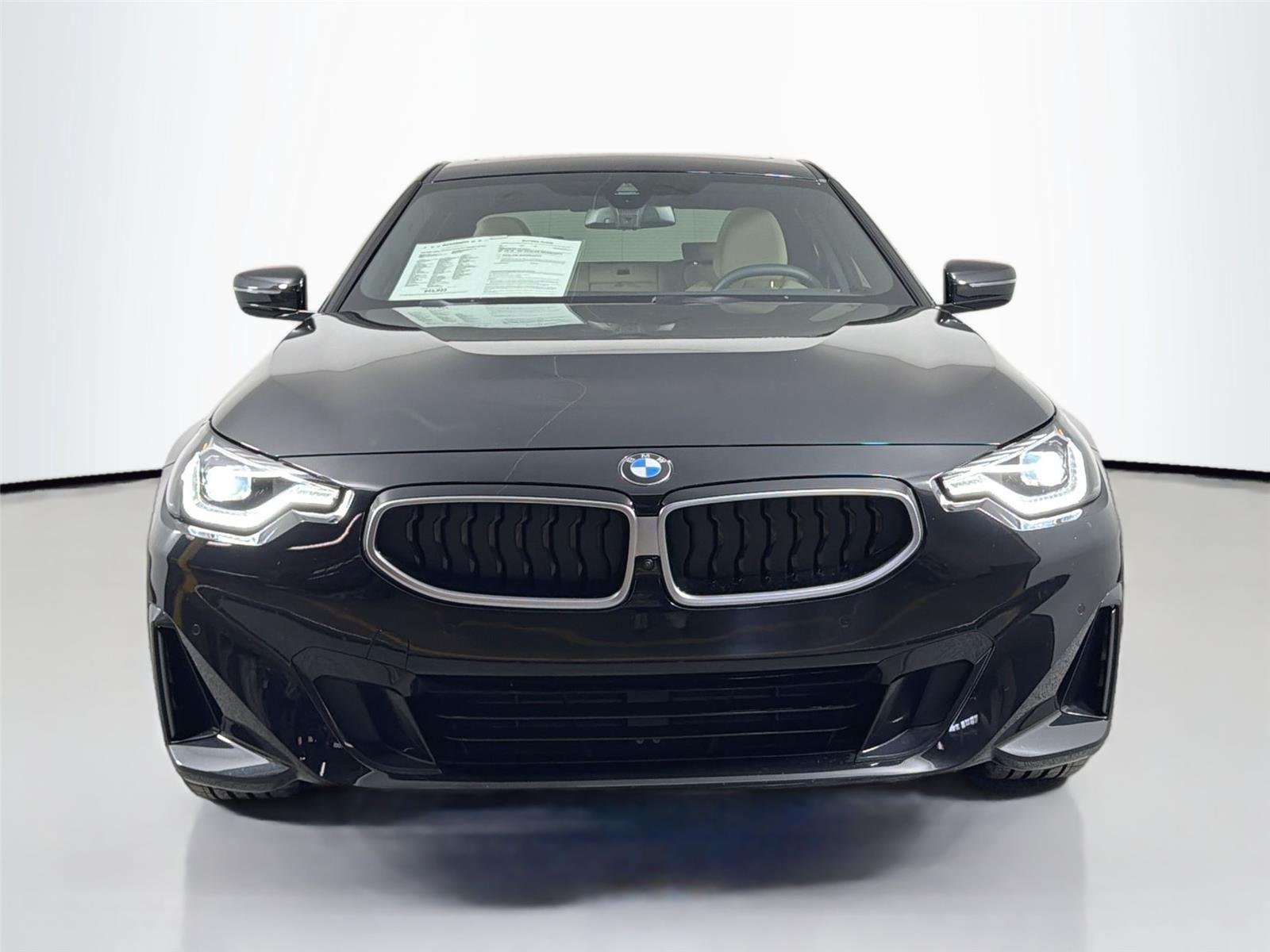 Certified Used 2025 Black Sapphire Metallic BMW 230i xDrive image 2