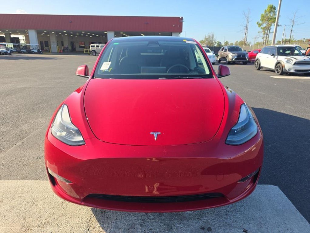 Used 2022 Tesla Model Y Long Range with VIN 7SAYGAEE4NF541833 for sale in Miami, FL