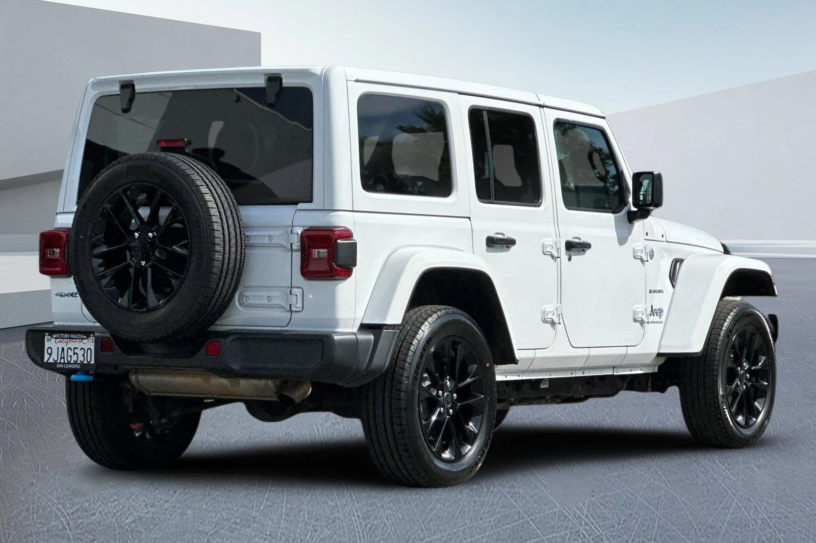 Used 2024 Bright White Clearcoat Jeep Sahara 4xe image 4