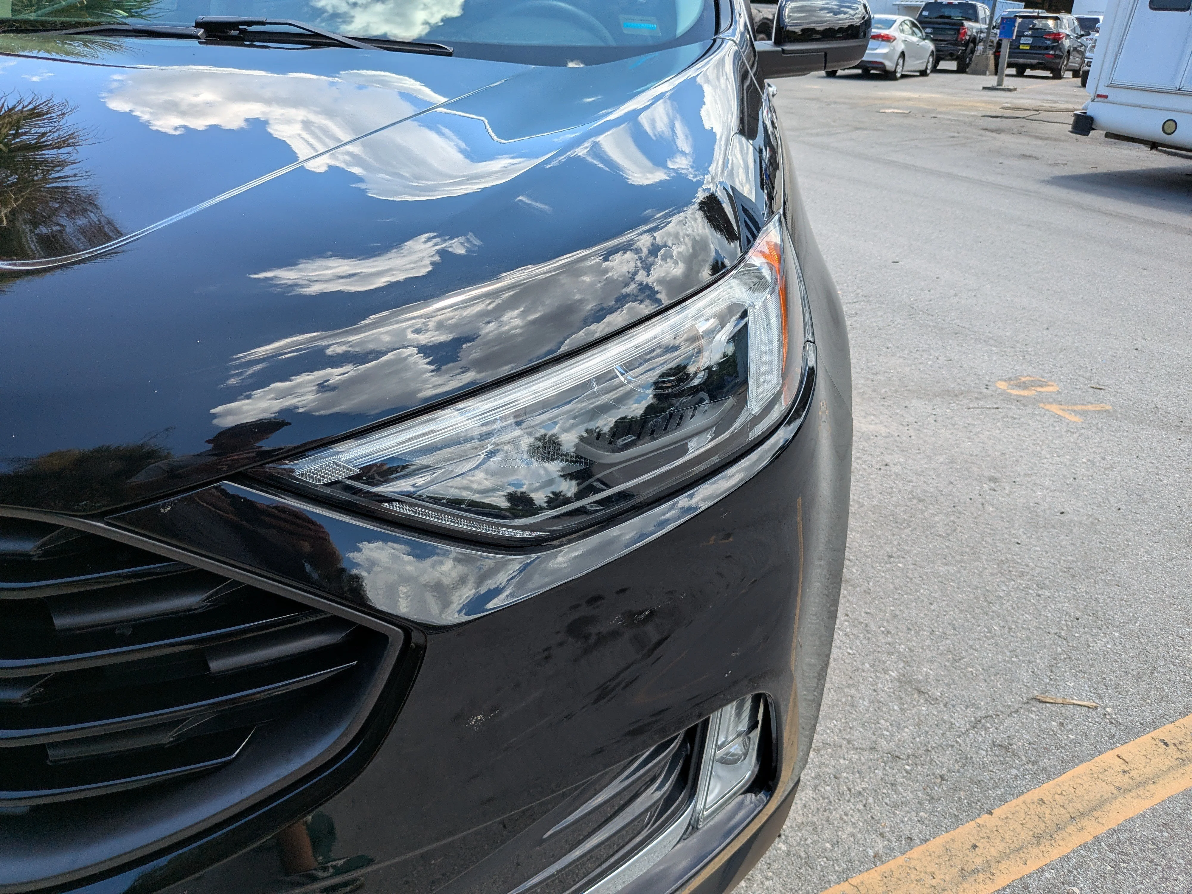 Used 2024 Agate Black Metallic Ford SEL image 11