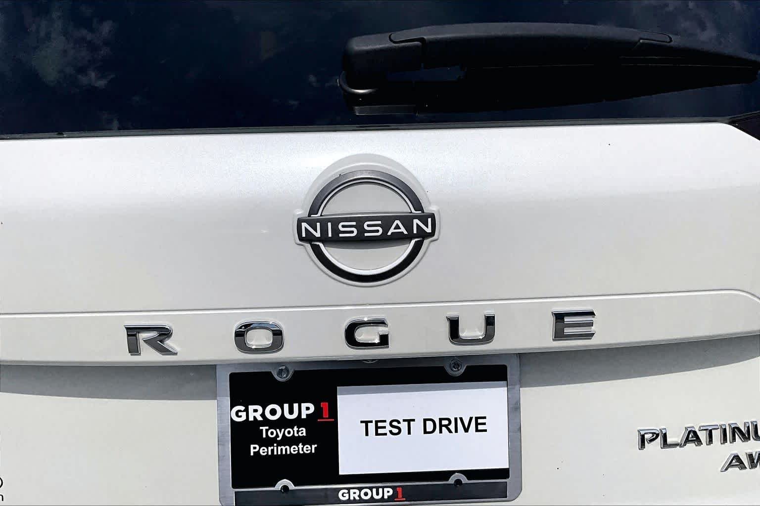 Used 2023 Pearl White Tricoat/Super Black Nissan Platinum image 31