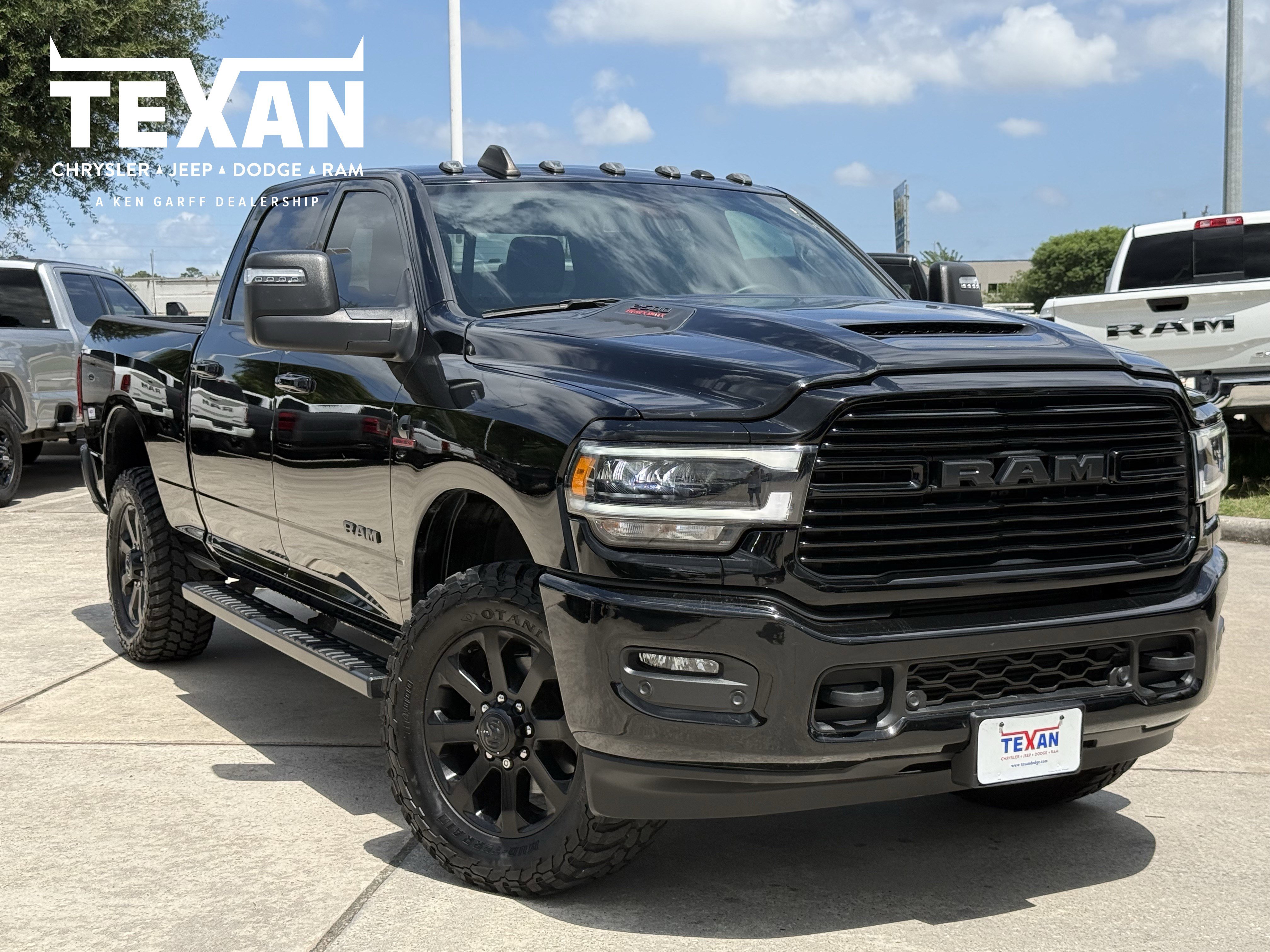 Used 2024 Diamond Black Crystal Pearlcoat Ram Laramie image 1