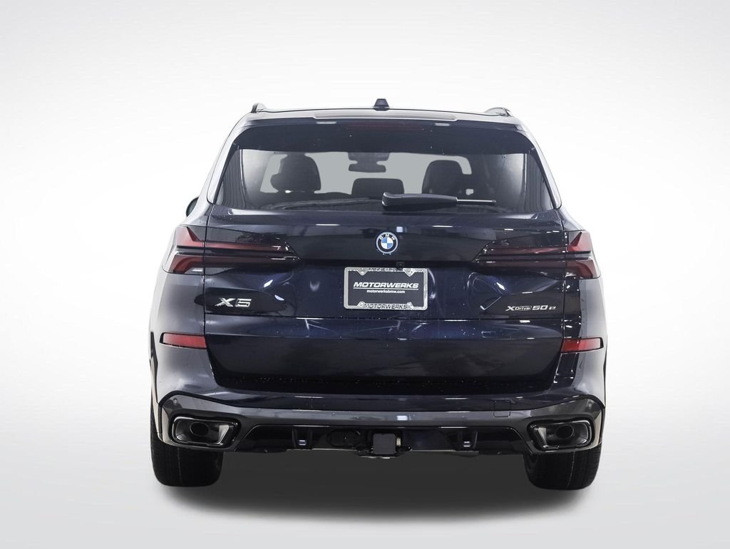 Used 2026 Carbon Black Metallic BMW xDrive50e image 4