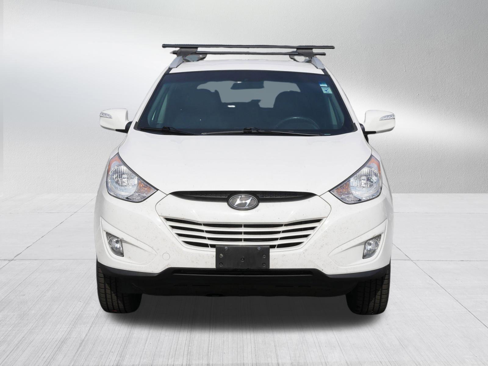 Used 2013 Hyundai Tucson GLS with VIN KM8JUCAC6DU685831 for sale in Bloomington, MN