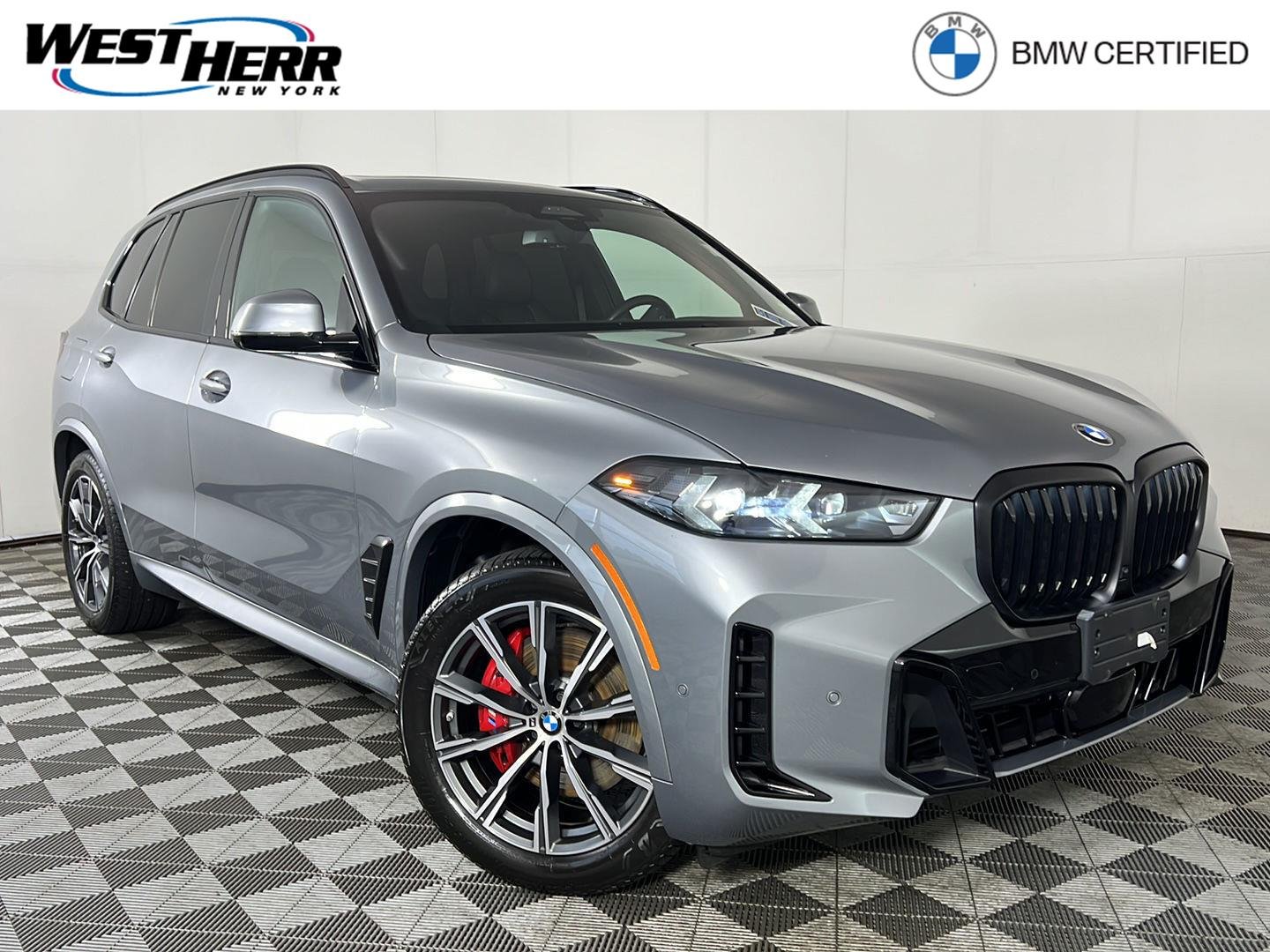 Certified Used 2024 Skyscraper Grey Metallic BMW xDrive40i image 1
