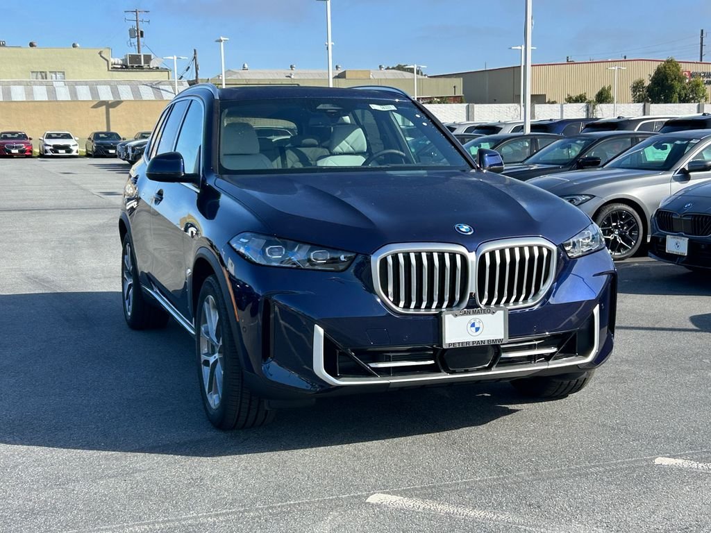 New 2026 Tanzanite Blue II Metallic BMW xDrive50e image 7