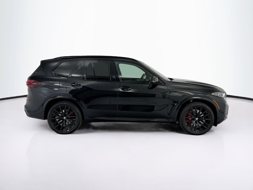 New 2026 Black Sapphire Metallic BMW sDrive40i image 4