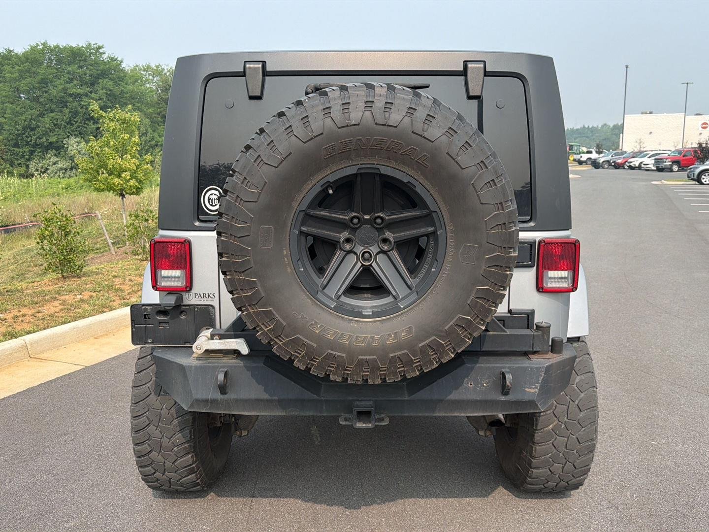 Used 2016 Billet Silver Metallic Clearcoat Jeep Sahara image 2