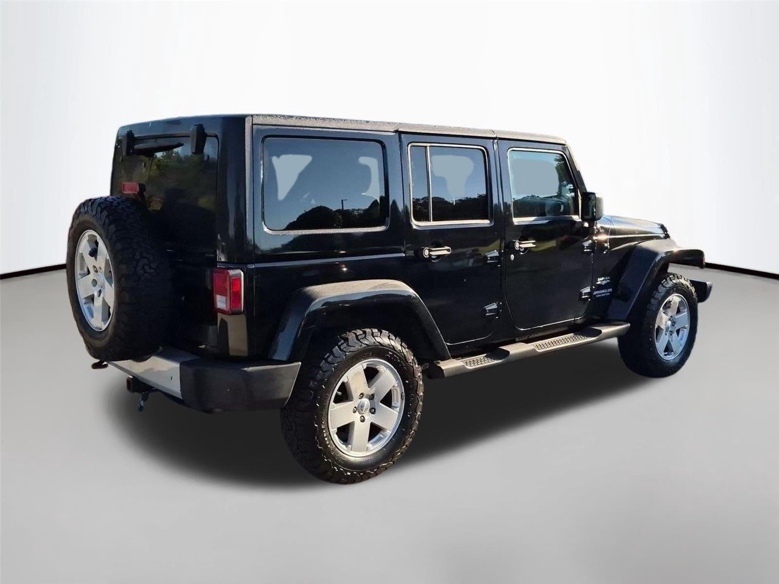 Used 2011 Black Clear Coat Jeep Sahara image 4