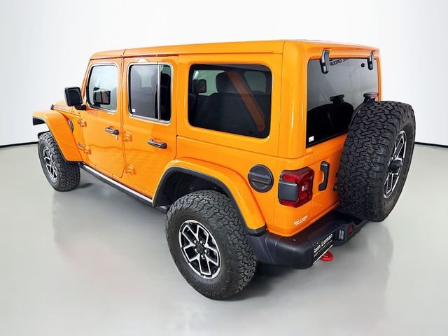 Used 2025 Orange Jeep Rubicon image 5