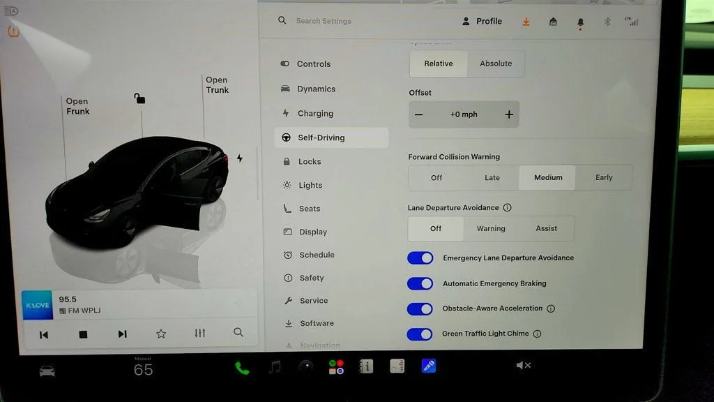 Used 2023 Solid Black Tesla RWD image 18