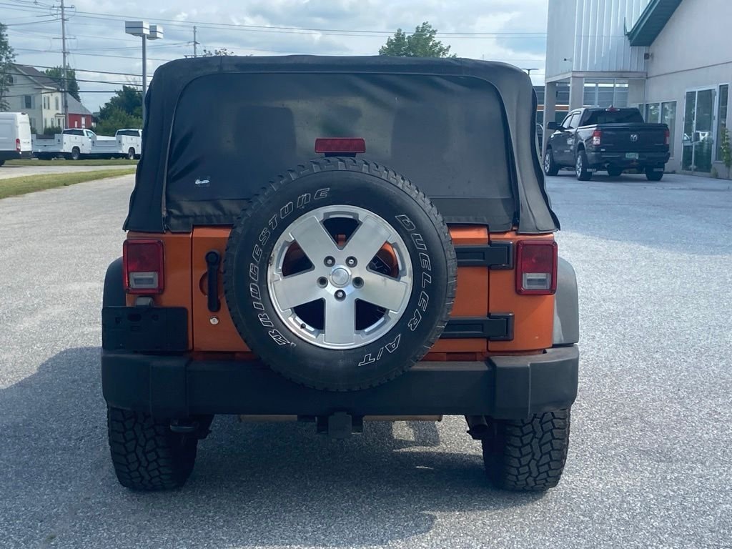 Used 2011 Mango Tango Pearlcoat Jeep Sport image 6