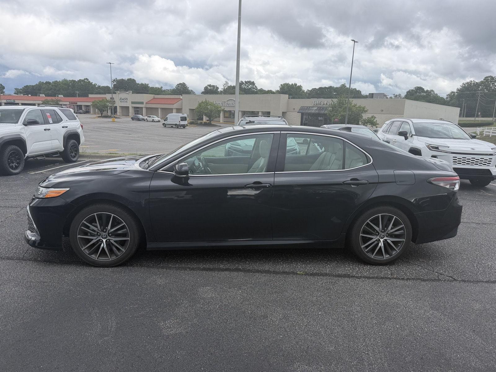Used 2023 Midnight Black Metallic Toyota XLE image 4