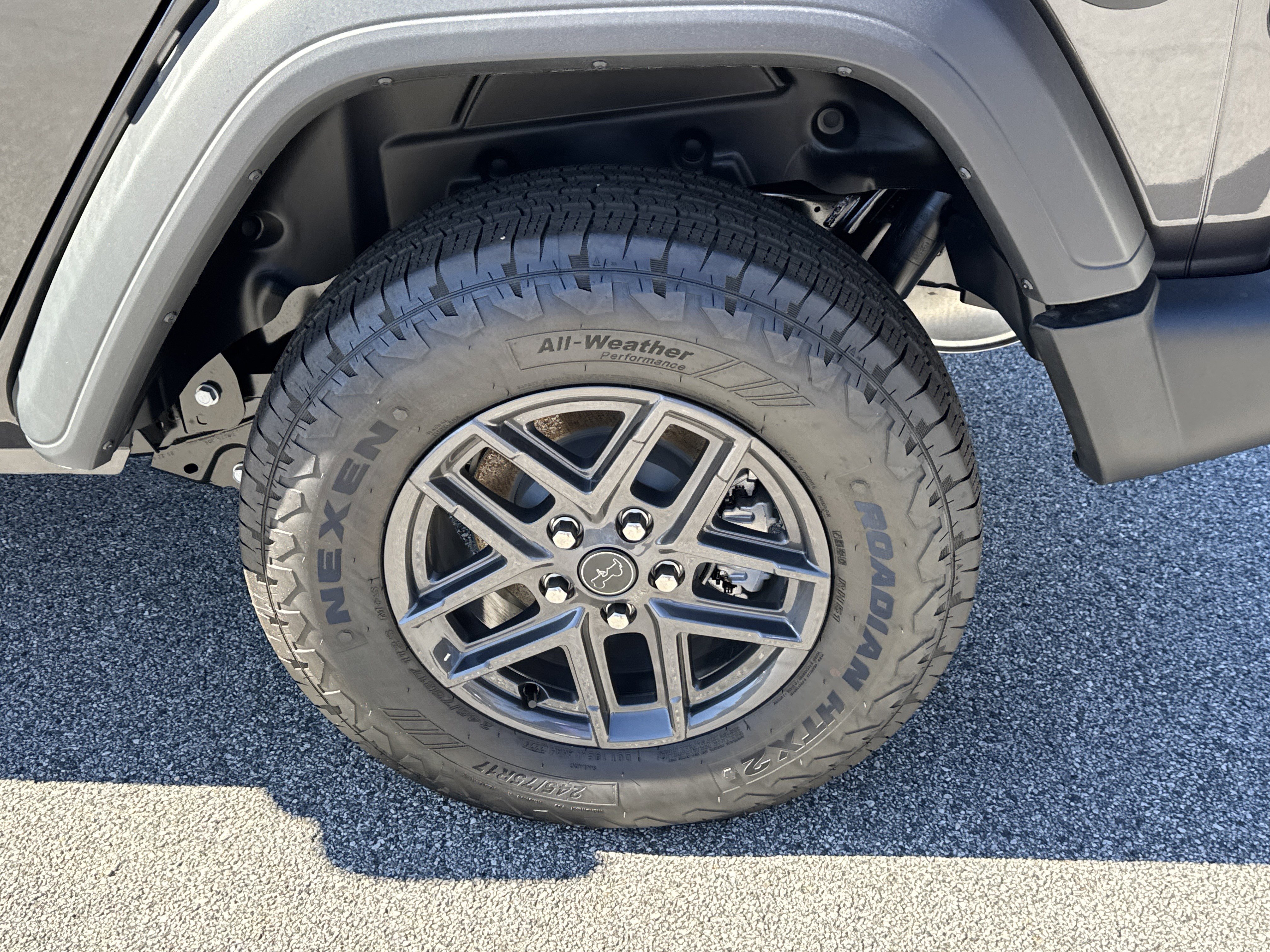 New 2025 Granite Crystal Metallic Clear-Coat Exterior Paint Jeep Sport S image 13