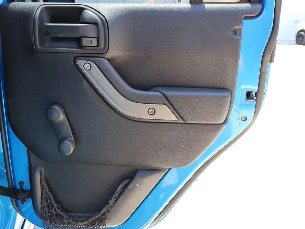 Used 2014 Blue Jeep Unlimited Sport image 10
